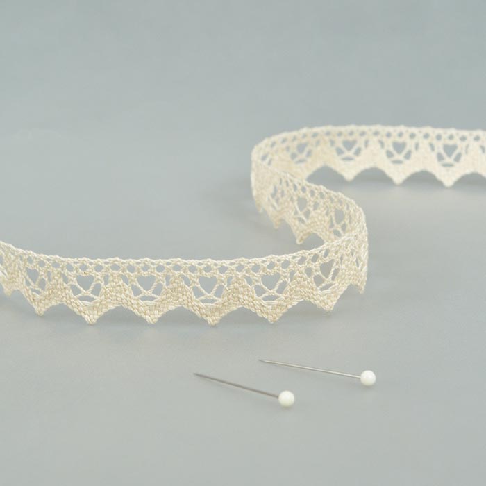 Dentelle aux fuseaux, crème